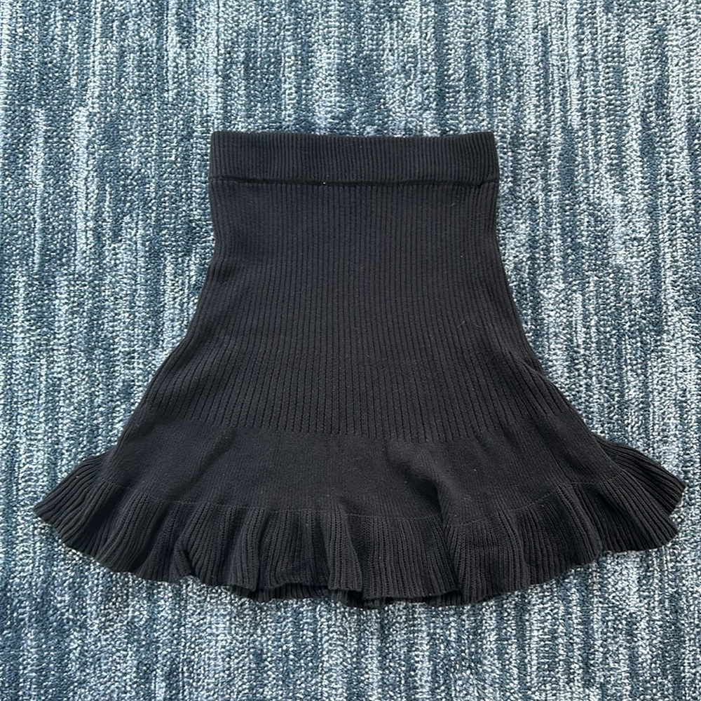 Free People black knee length skirt. Size M
